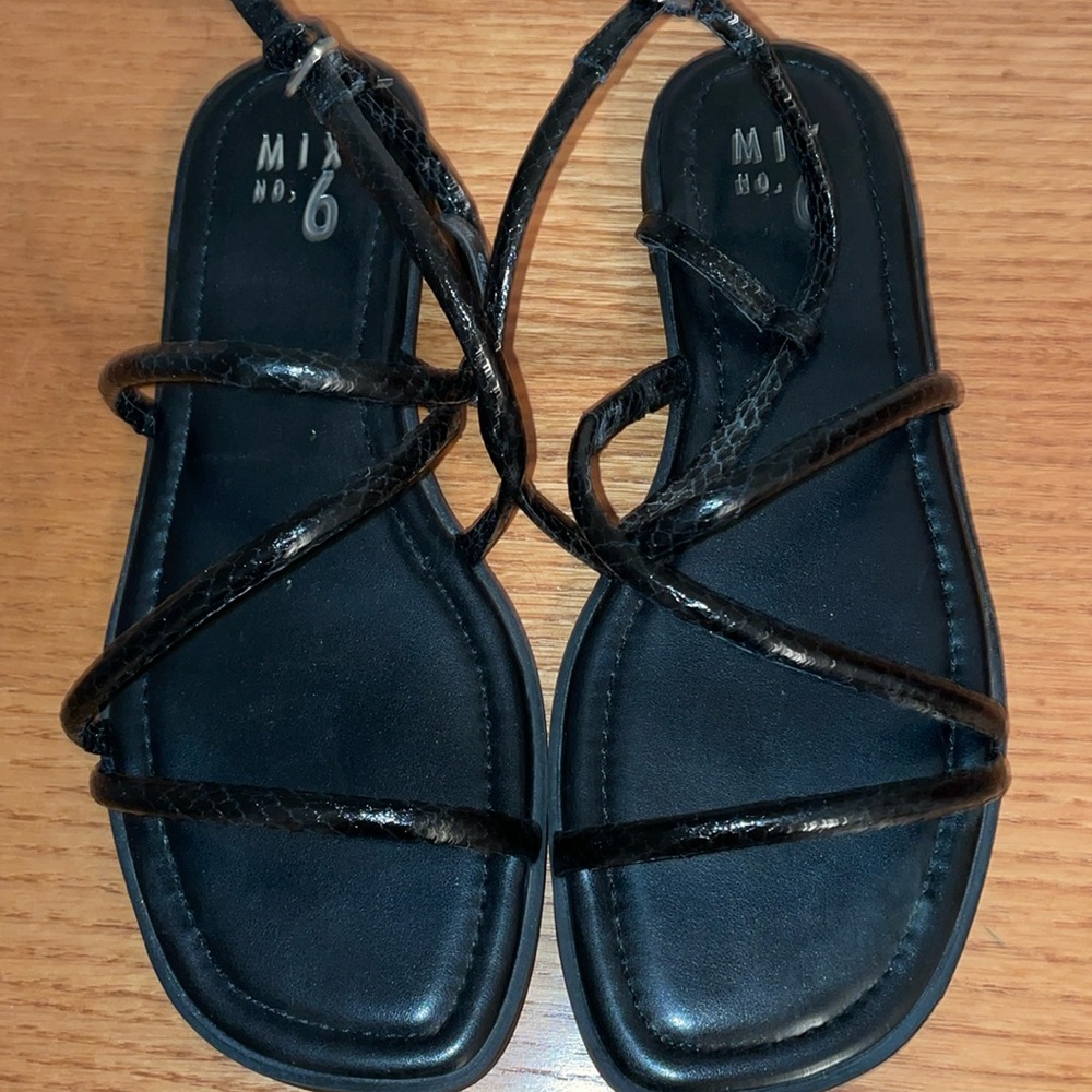 Mix No. 6 black “slinky snake” printed strappy sandals in size 8.